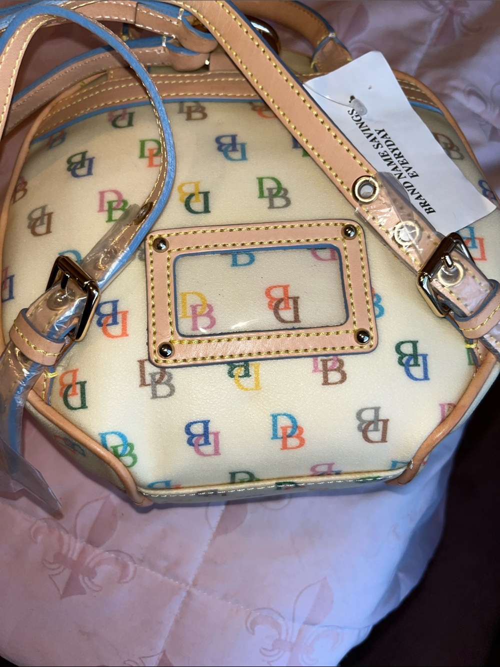 NWT Dooney & Bourke Cream Multicolor Logo Coated Canvas Backpack with Tan Trim - Picture 13 of 14